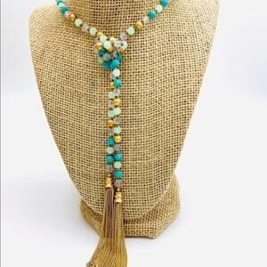 Teal glass crystal and gold beads‎ lariat. Knotted